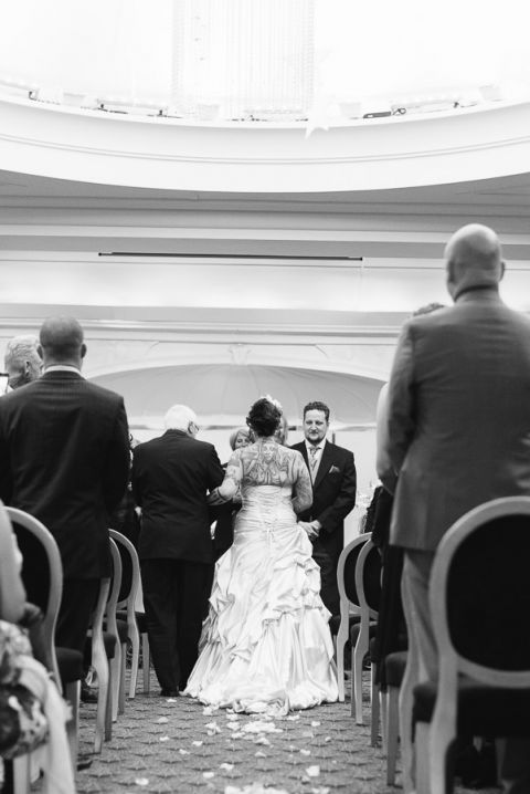 Cumberland Hotel Wedding Photographer walking down the aisle