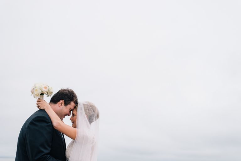 Hotel du vin dorset wedding photographer bride and groom kissing