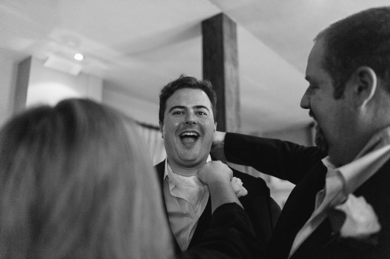Hotel du vin dorset wedding photographer bride and groom laughing