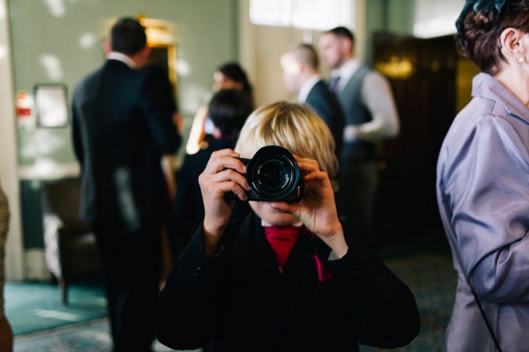 rhinefield house hotel hampshire wedding photographer small boy with camera