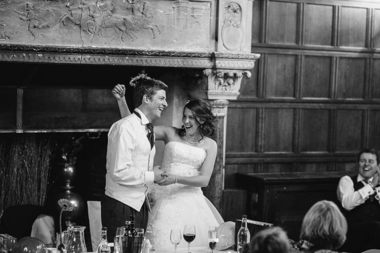 rhinefield house hotel hampshire wedding photographer bride and groom hugging