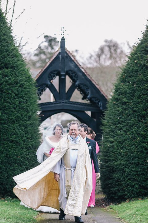rhinefield house hotel hampshire wedding photographer bride walking towards church