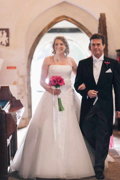 rhinefield house hotel hampshire wedding photographer bride walking down the aisle with her father