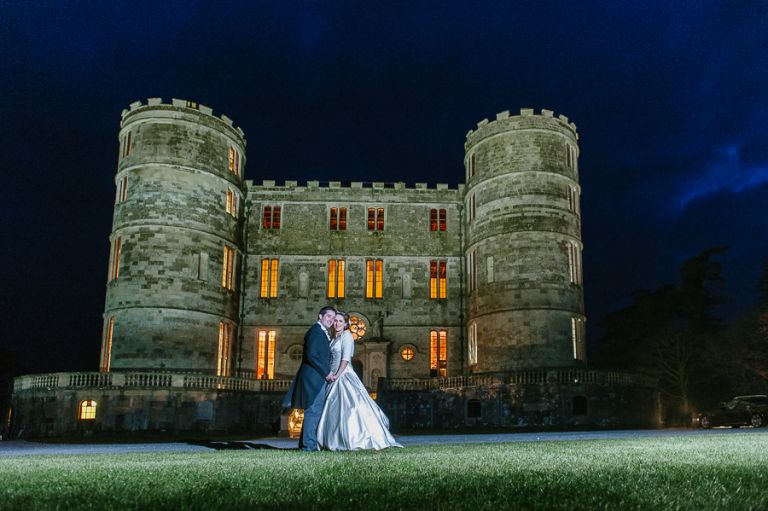 Lulworth Castle Dorset Wedding Photographer at night with bride and groom