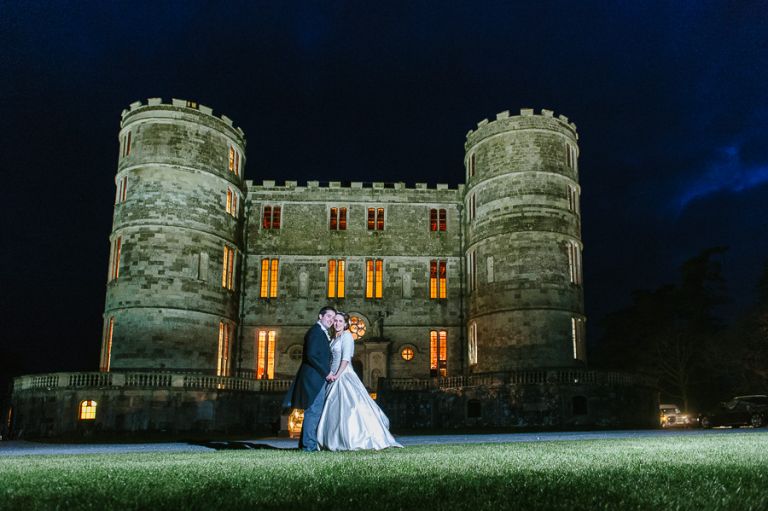 Lulworth Castle Dorset Wedding Photographer at night with bride and groom