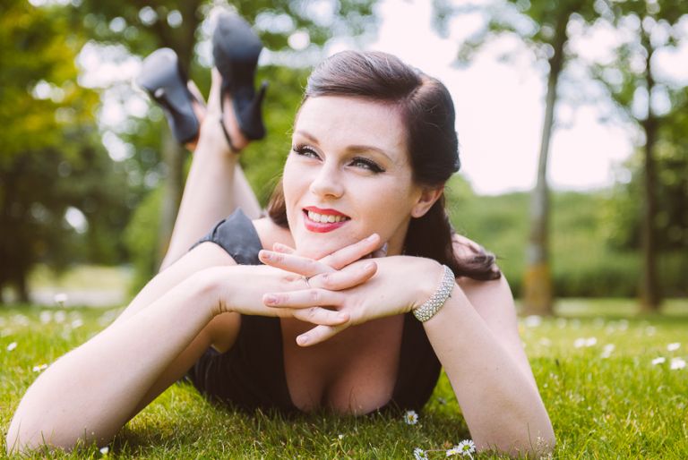 Tania Sandbanks Hotel Dorset Wedding Photographer on grass outside museum