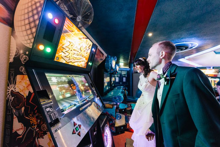 Green House Hotel Bournemouth Wedding Photographer bride and groom dancing in the arcade