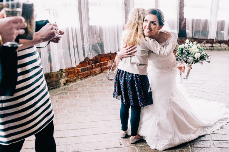 Lillebrooke Manor Wedding bride speaking to child