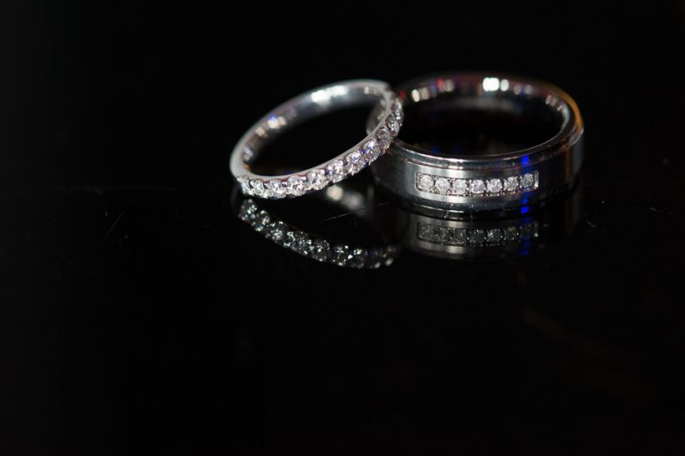Cumberland Hotel Poole Wedding Ceremony Photograph rings in reflection