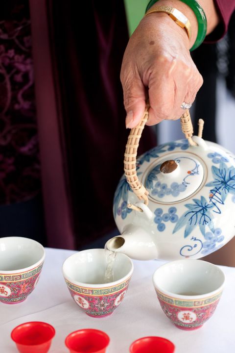 wedding chinese tea ceremony tea being poured at Langtry Manor Hotel Bournemouth