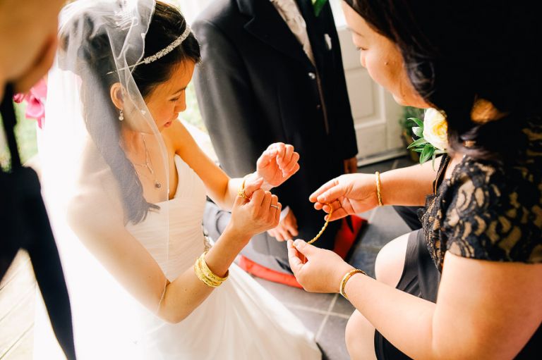 wedding chinese tea ceremony bride getting gifts at Langtry Manor Hotel Bournemouth