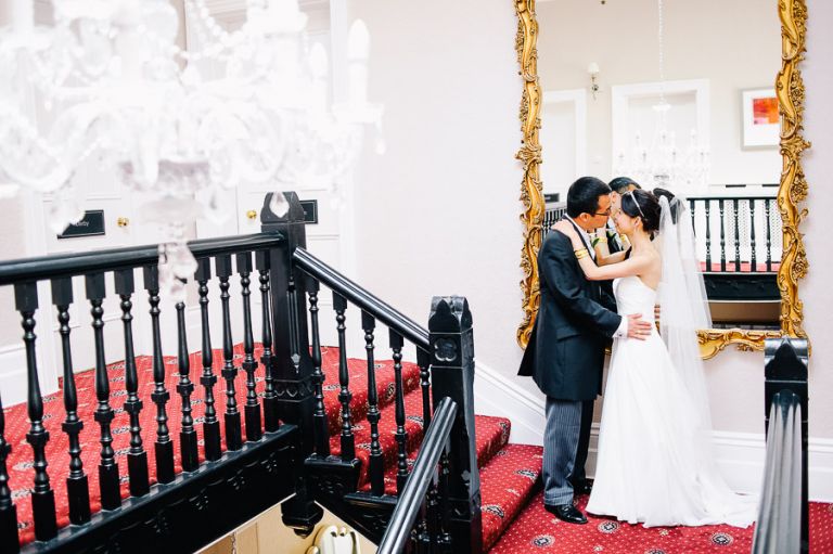 bride and groom portraits at Langtry Manor Hotel Bournemouth