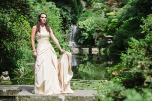 italian villa at compton acres bridal wedding photography sam posing on the bridge in the japanese gardens