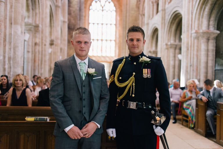 christchurch priory wedding photography groom and best man