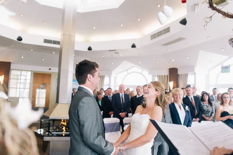 sandbanks bournemouth beach wedding ceremomy bride and groom