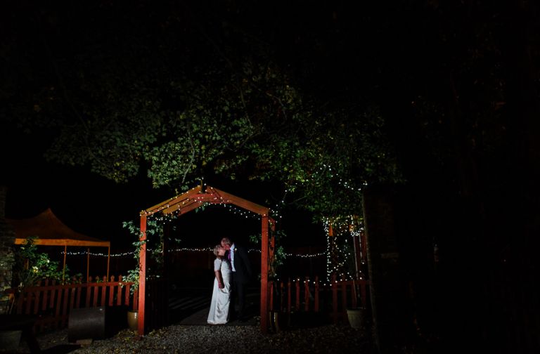 Silent Woman Inn wedding photographer Portrait of Sylvie and Peter outside at night