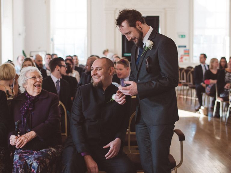 wedding at poole guildhall groom waiting for his bride