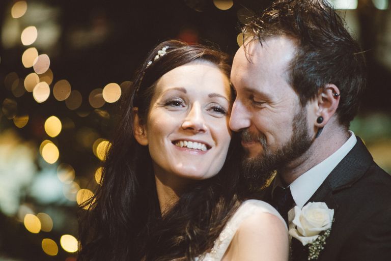 wedding couple at moors valley in front of christmas tree