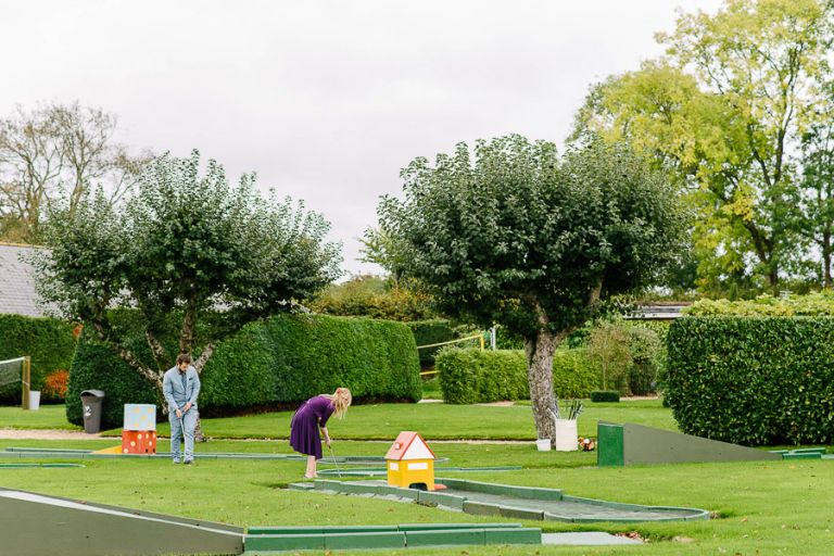 guests at autumnal wedding at orangery wimborne
