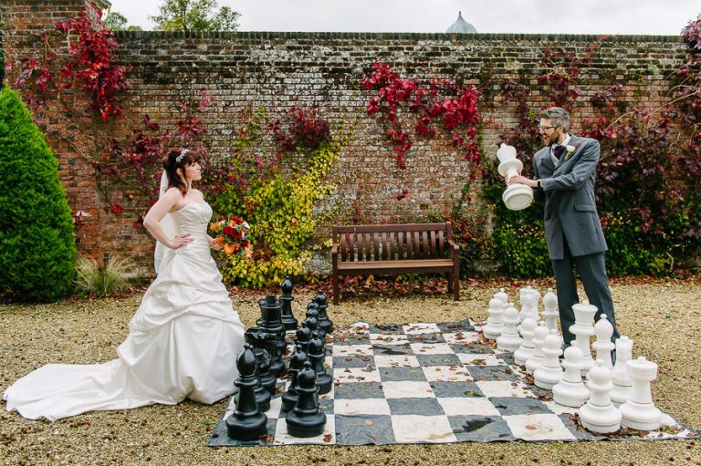 checkmate at autumnal wedding at orangery wimborne