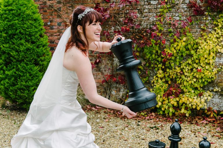 black queen at autumnal wedding at orangery wimborne