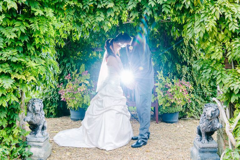 king and queen at autumnal wedding at orangery wimborne