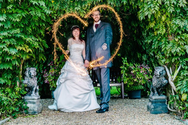 sparklers at autumnal wedding at orangery wimborne