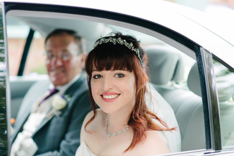 autunmal wedding at orangery wimborne bride in car