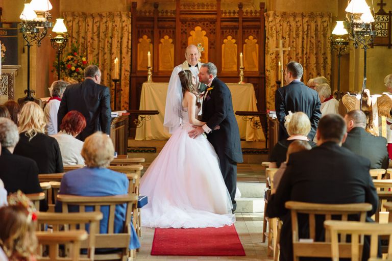 weddings at the Old Vicarage christchurch an new forest - bride and groom first kiss as man and wife