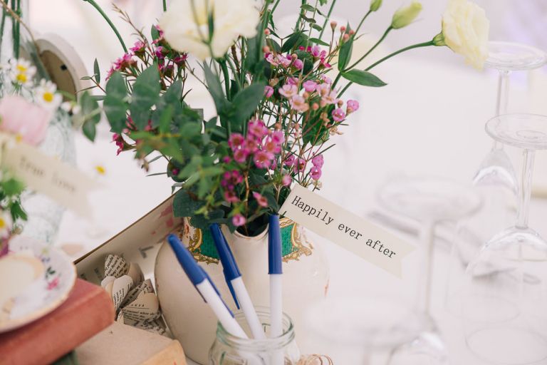 dorset garden marquee wedding details flowers in vintage china teacups