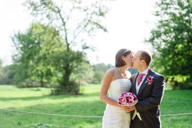 weddings-at-deans-court-wimborne-wedding-photographer bride and groom portraits in sunshine