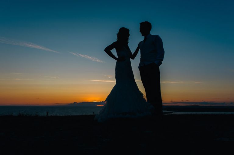 Wedding at Weymouth and Portland Sailing Academy - Silhouettes at sunset