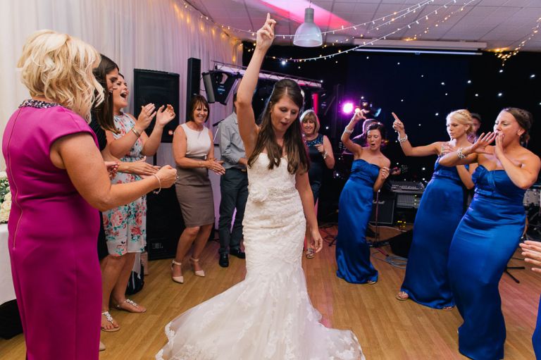 Wedding at Weymouth and Portland Sailing Academy - Party Dancing Bride