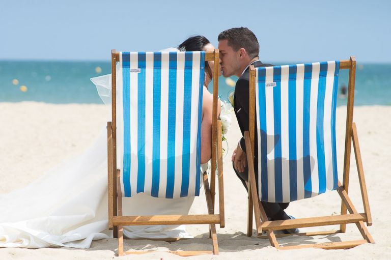 bournemouth beach wedding bride and groom in deckchair