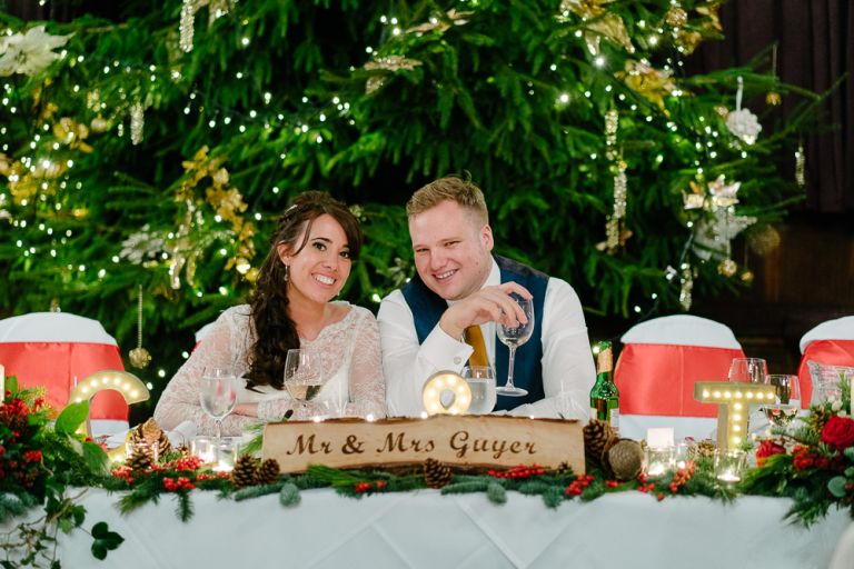 Claire and Timmy Relaxing in front of the Christmas Tree