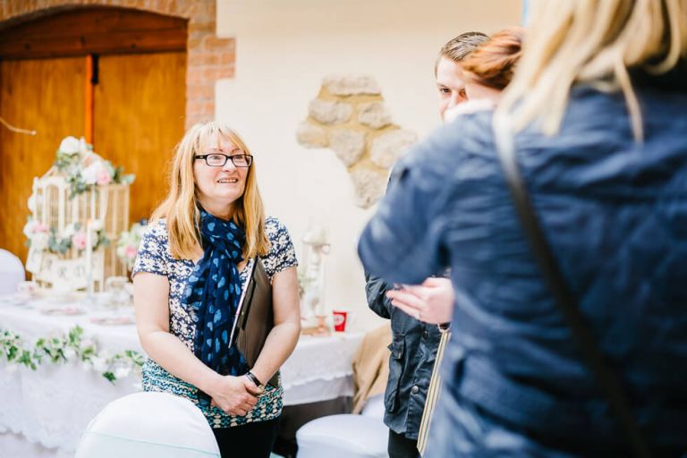 victorian barn wedding showcase speaking to customers