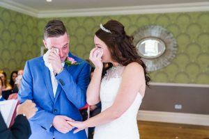emotional wedding ceremony with both bride and groom getting emotional at the green house hotel